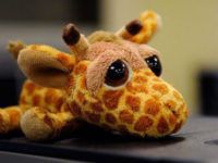 Грустный жираф - мягкая игрушка