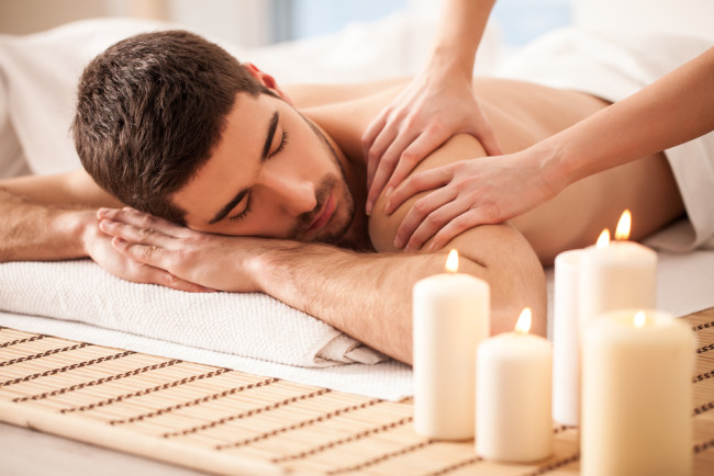 Young man enjoying a massage.