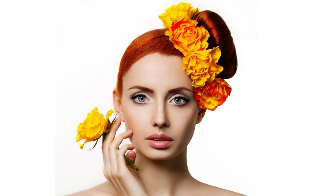 Beautiful woman with yellow flowers