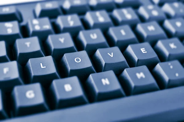 Ключи клавиатуры, формирующей любовь слова — стоковое фото
